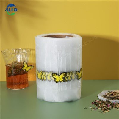 Piramidi Nylon Malji Trijangolu Teabag Ippakkjar Borża Film Roll bi String u Tag